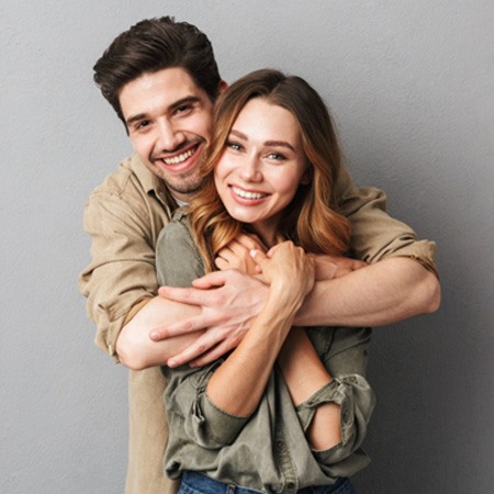 Portrait of smiling, happy young couple