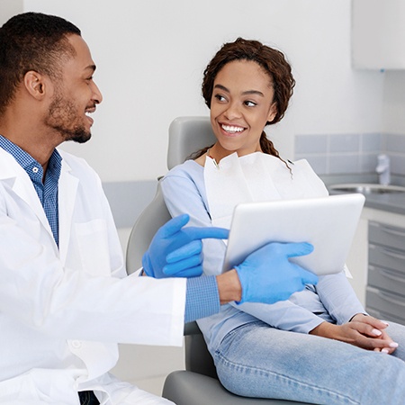 Woman smiling at the dental office