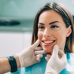 A dentist assessing his patient for cosmetic dentistry