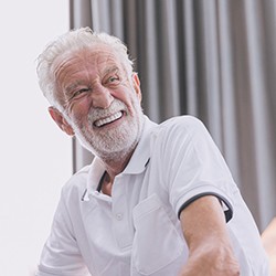 Man laughing with dentures