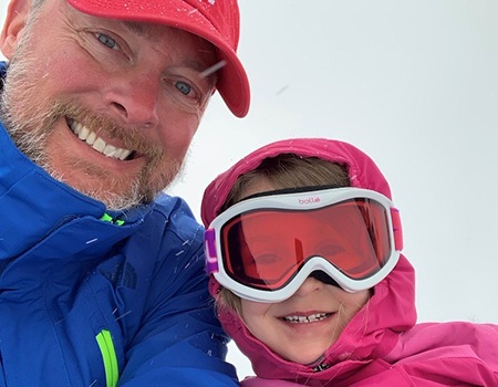 Dr. Fana and his son skiing