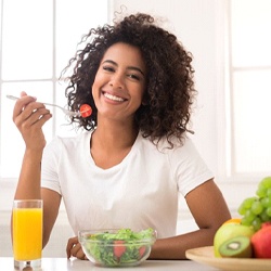 woman eating a salad