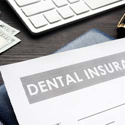 Dental insurance form resting on a table