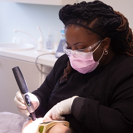 Smiling woman at dental office