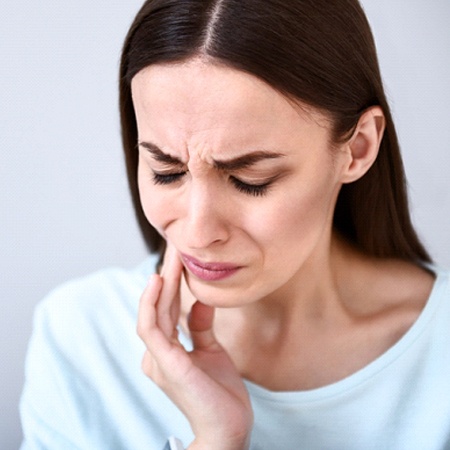 Woman with tooth pain