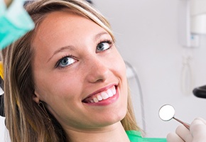 Smiling woman in dental chair