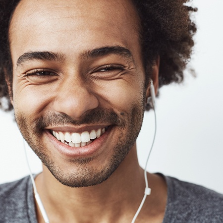 man smiling after getting teeth whitening in Savannah