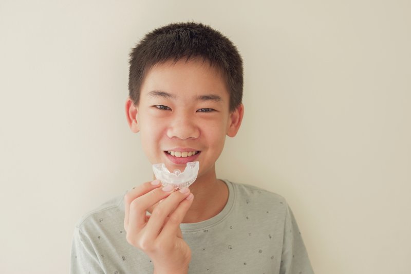 child wearing a mouthguard in Savannah