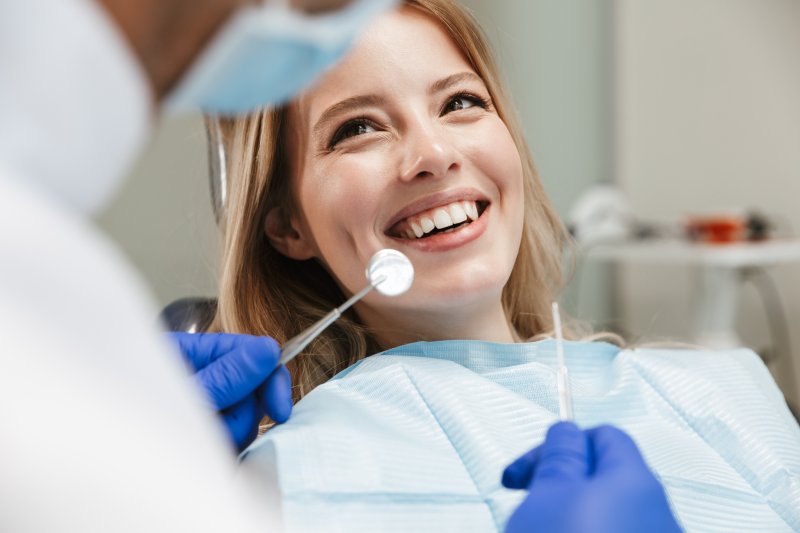 patient talking to their dentist