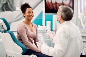 Woman listening to her dentist after a checkup