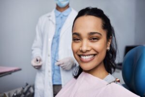 Woman smiling after her root canal